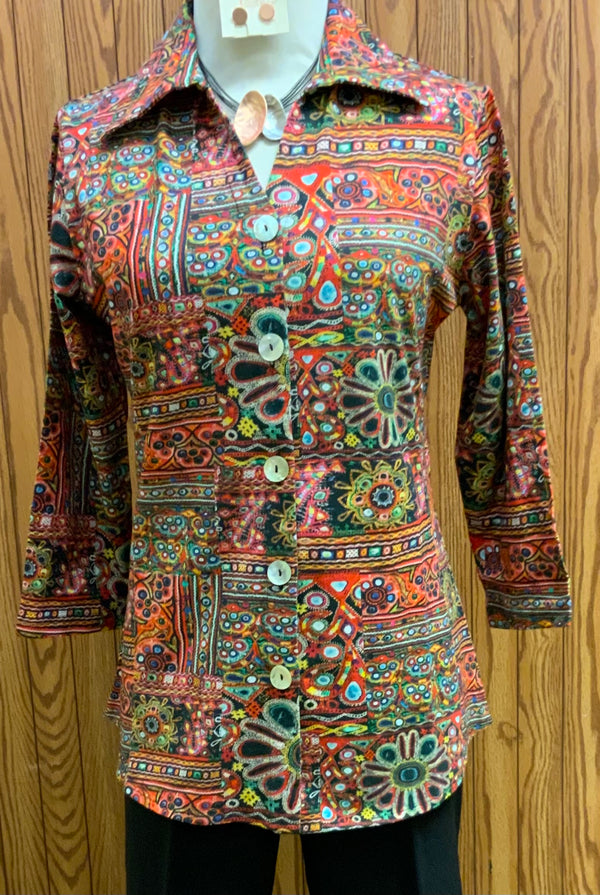 Sylvia Print Blouse | A colorful and roomy shirt offers the right amount of casual and sophisticated with its 3/4 sleeve and slightly longer back panel, offering loads of comfort.  96% Cotton Knit 4% Spandex  Machine Washable  Available Small - 3X